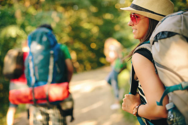 istock Group of hikers outdoors enjoying the walk 1068972566