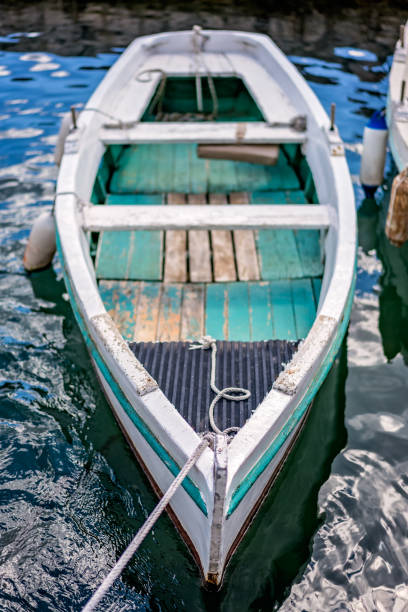 istock Small fishing boat on the shore 1068974702