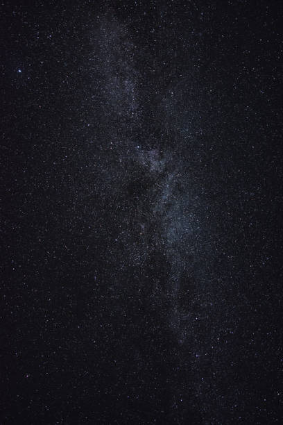 istock The milky way in the starry sky 1068976336