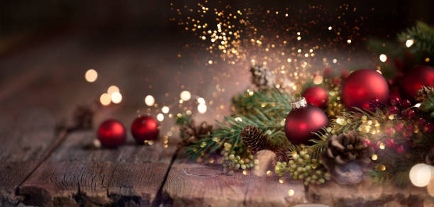 istock Christmas garland wreath on old wood background 1068982486