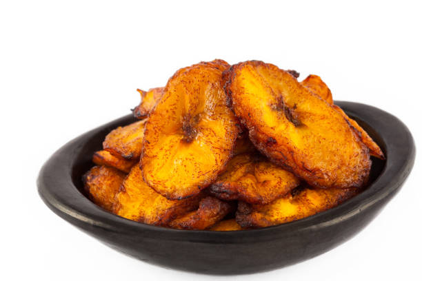 istock Deep fried ripe plantain slices isolated in white background 1068984608