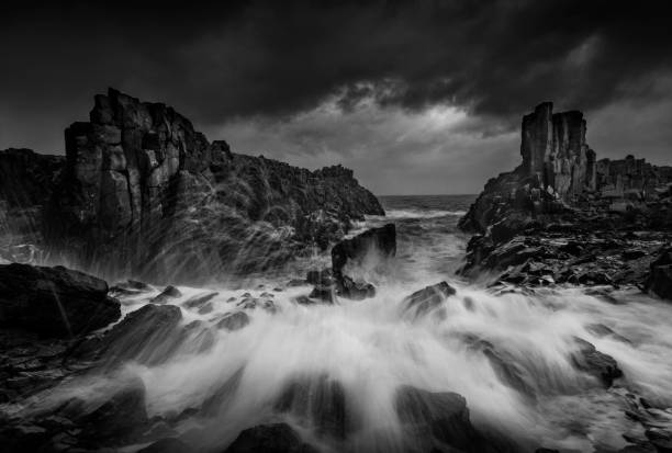 istock Bombo Basalt Columns moody ocean seascape 1068984686
