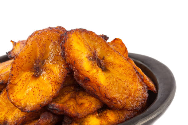 istock Deep fried ripe plantain slices isolated in white background 1068984706