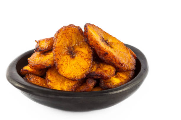 istock Deep fried ripe plantain slices isolated in white background 1068984822