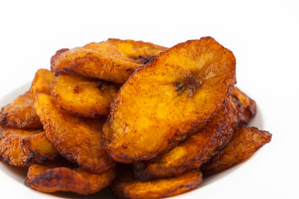 istock Deep fried ripe plantain slices isolated in white background 1068984956