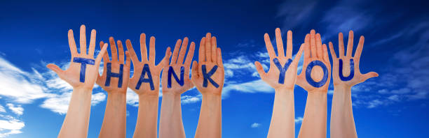 istock Many Hands Building Thank You, Blue Cloudy Sky 1068984972