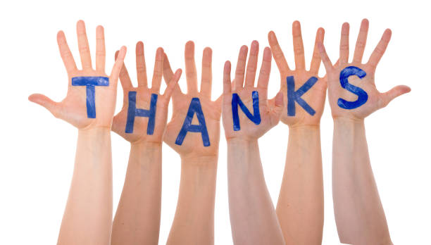 istock Many Hands Building English Word Thanks, Isolated 1068984998