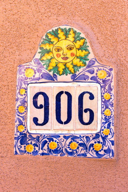 istock Colorful Mexican Address Tiles Decorated with Sun 1069001492