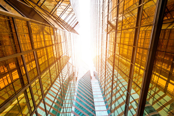 istock Looking up at golden skyscrapers 1069016102