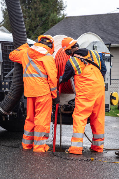 Everett, Washington / USA - 11/05/2018 - City Work Crew Cleaning Sewer After Winter Storm