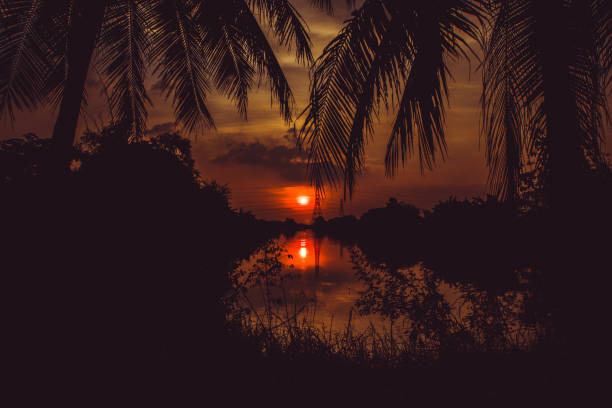 istock sunset with silhouette sky. Thailand 1069028798
