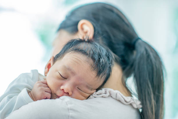 istock Newborn baby sleeping 1069028846