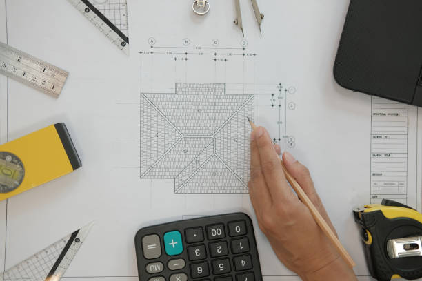 istock house blueprint of real estate project at architect engineer  workplace. building construction tool top view 1069030902