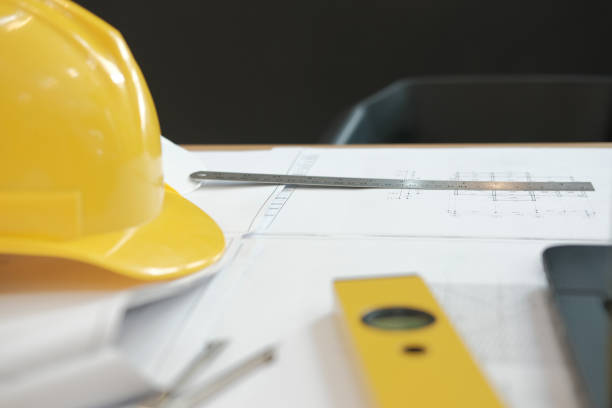 istock house blueprint of real estate project at architect engineer  workplace. building construction concept 1069031054