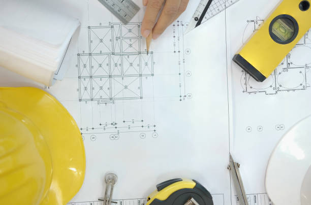 istock house blueprint of real estate project at architect engineer  workplace. building construction tool top view 1069032426