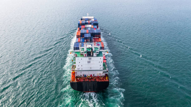 istock Aerial view cargo container ship sailing, container cargo ship in import export and business logistic and transportation of international by container ship in the open sea. 1069034818