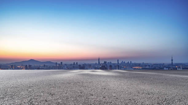 istock Panoramic skyline and modern buildings with empty road 1069034874