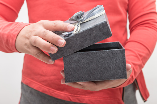 Woman giving christmas present