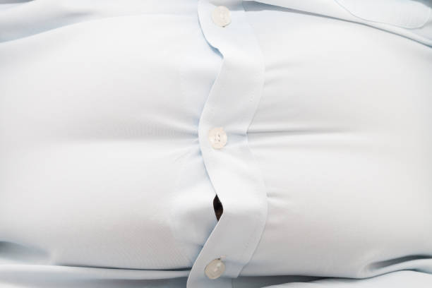 pancia grassa maschile - belly button foto e immagini stock