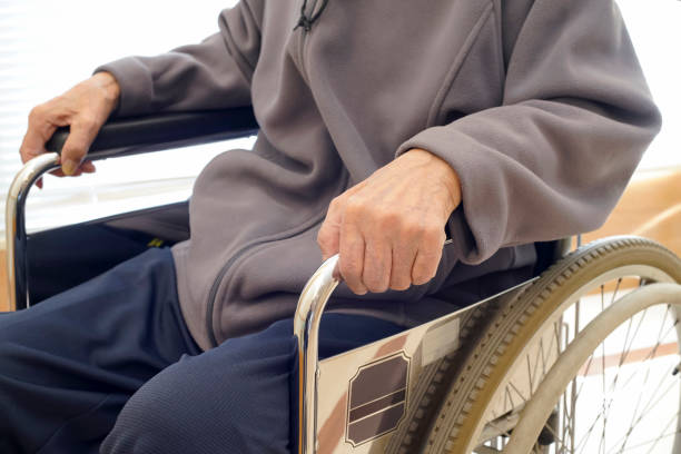istock Old man sitting on wheelchair 1069043710