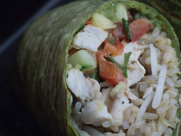 istock Healthy Grilled Chicken Wrap Close-Up 1069045590