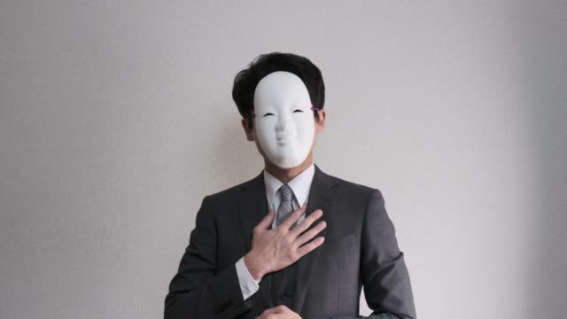 4k video of strange masked businessman who hospitality