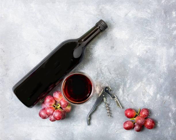 istock Glasses and bottles of red wine 1069056212