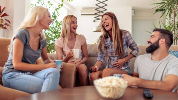 istock Friends enjoying at home 1069063036