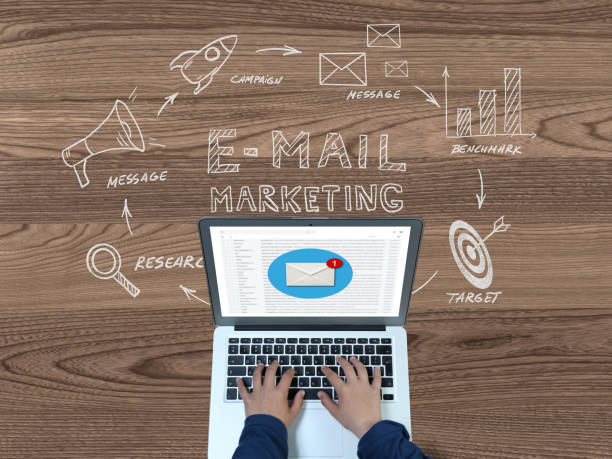 istock Email marketing online message communication laptop desktop top view 1069070996