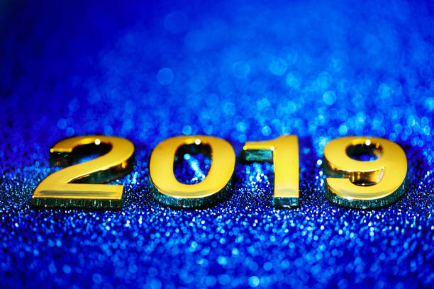 istock Golden New Year 2019 on a sparkling defocused background (blue) 1069079446