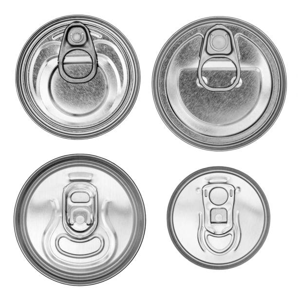 istock Set of four different tin cans, top view, close-up macro, isolated on white background, black and white. 1069079644