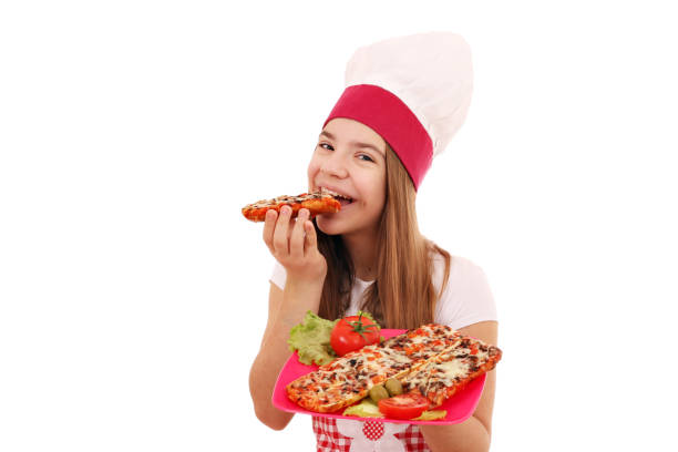 istock Happy girl cook eats a sandwich 1069081702