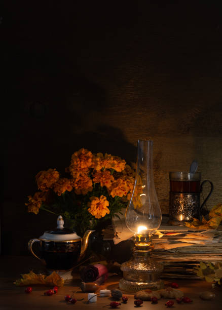 istock Still life with a kerosene lamp, tea in a glass 1069083338