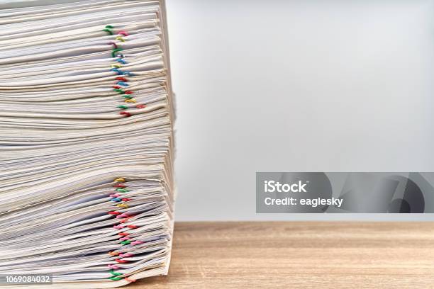 Pile Overload Paperwork Report On Wooden Table With Copy Space Stock Photo - Download Image Now