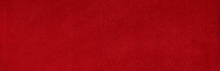 Banner.velvet texture background red color. Christmas festive baskground. expensive luxury, fabric, material, cloth.Copy space.