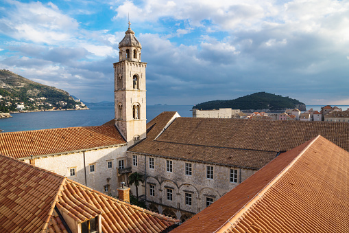 Tower and yard of the Dominican Monastery in Dubrovnik with ocean view, Croatia