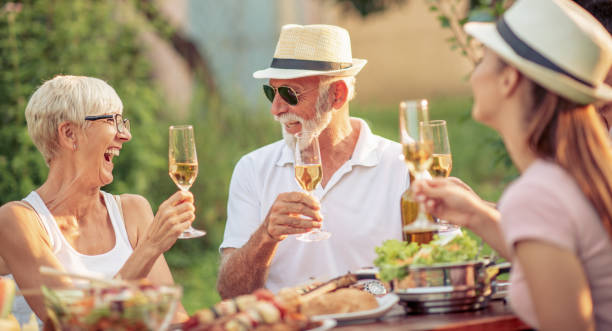 istock Family having a barbecue lunch in their garden 1069093844