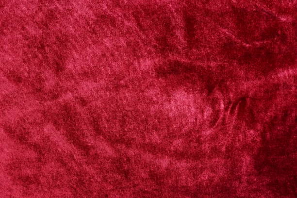 istock velvet texture background red color. Christmas festive baskground. expensive luxury, fabric, material, cloth.Copy space. 1069098398