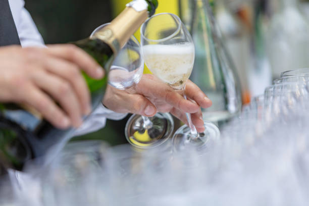 istock Serving champagne at cocktail party 1069101514