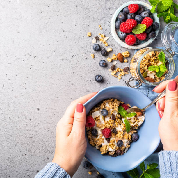 istock Oat granola with berries and yoghurt 1069103658