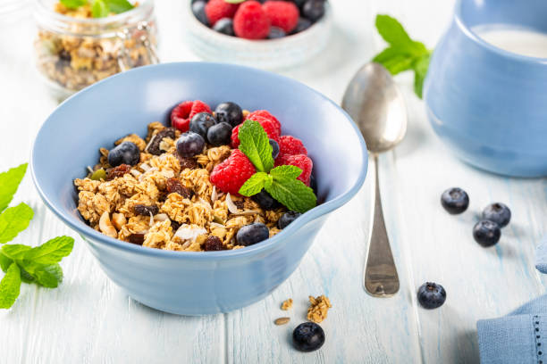 istock Oat granola with berries and yoghurt 1069103672