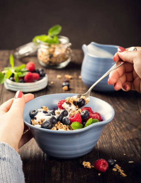 istock Oat granola with berries and yoghurt 1069103700