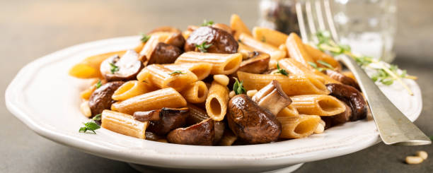 istock Homemade whole grain pasta penne 1069103710