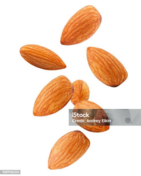 Falling Almond Isolated On White Background Clipping Path Full Depth Of Field Stock Photo - Download Image Now