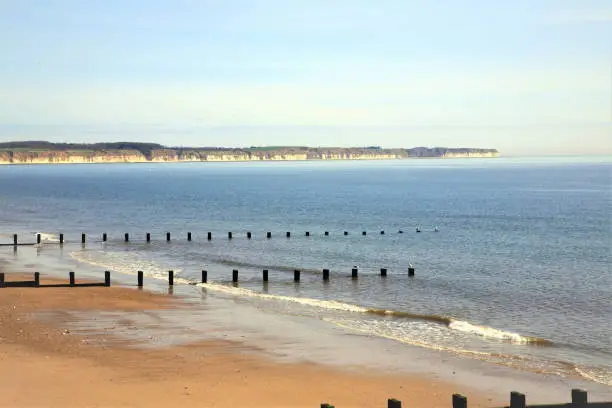 Bridlington, Yorkshire, UK. April 22, 2015. The North beach and bay with Flamborough Head in the background at Bridlington in North Yorkshire, UK.