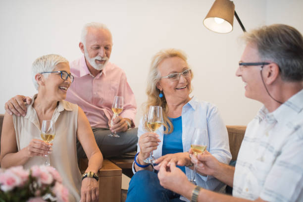 istock People talking over a glass of wine 1069115778