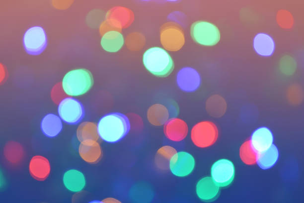 istock Bokeh lights background. Abstract bokeh circles background in retro style. Holiday defocused lights. Photo can be used for web design, surface textures, wallpapers and other. 1069116108