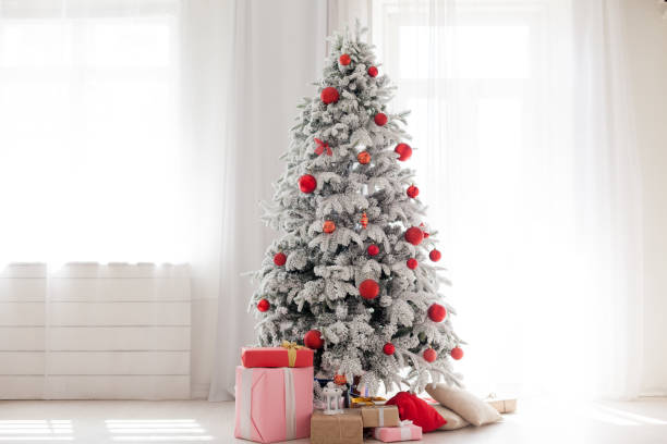 istock Christmas presents new year holidays Christmas tree 1069116370