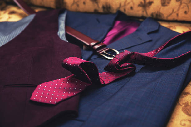 istock Man suit, tie, belt and jacket. Elegance and business man clothing. 1069121990