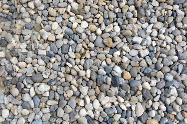 istock Stone pebbles for interior exterior decoration and industrial construction concept design 1069124750
